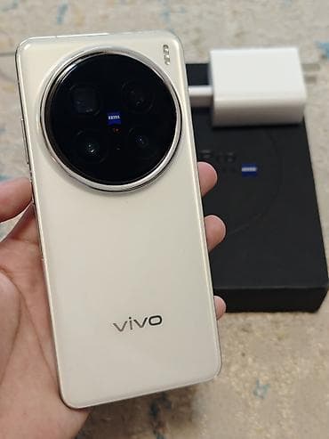 Vivo X200 Pro, Б/у, 256 ГБ, цвет - Белый, 1 SIM, 2 SIM, eSIM at lalafo.kg Vivo X200 Pro, Б/у, 256 ГБ, цвет - Белый, 1 SIM, 2 SIM, eSIM