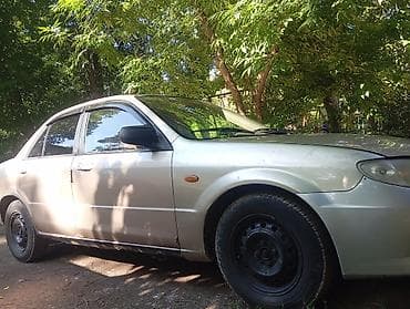 kia 5: Mazda Protege: 2001 г., 1.5 л, Автомат, Бензин, Седан — 9