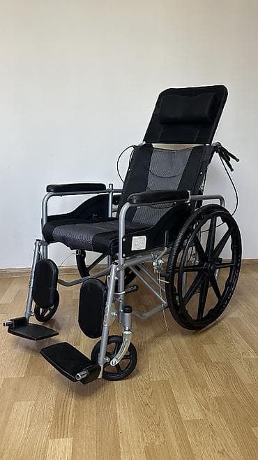 Инвалидная коляска с функцией лежачего положения и санитарным узлом -
