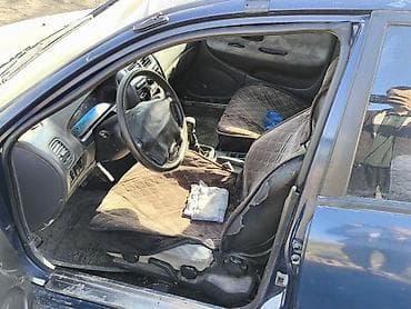 matiz bar: Mitsubishi Carisma: 1997 г., 1.6 л, Механика, Бензин, Седан — 7