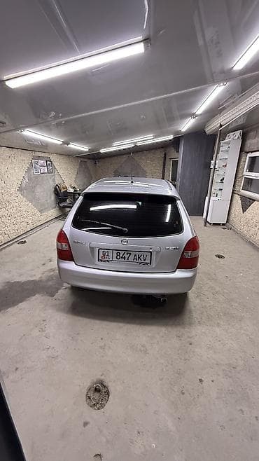 mazda d: Mazda 323: 2001 г., 1.6 л, Механика, Бензин, Универсал — 3