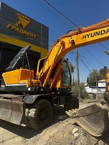 кобит: Экскаватор, Hyundai, 2011 г., Колесный — 4
