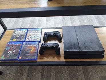Техника и электроника: Срочно продается Sony PlayStation 4 с комплектом аксессуаров и дисков — 1