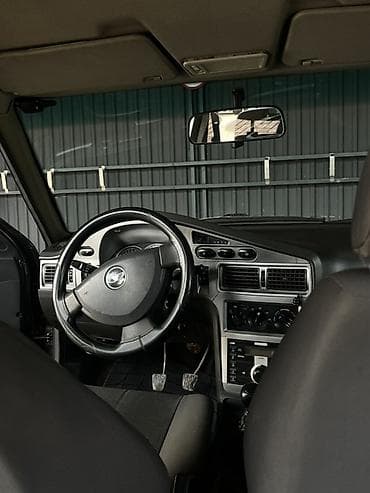 ланос 2011: Chevrolet Nexia: 2011 г., 1.6 л, Механика, Седан — 4