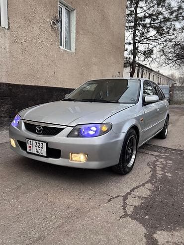 лисян авто: Mazda 323: 2003 г., 1.6 л, Бензин — 1