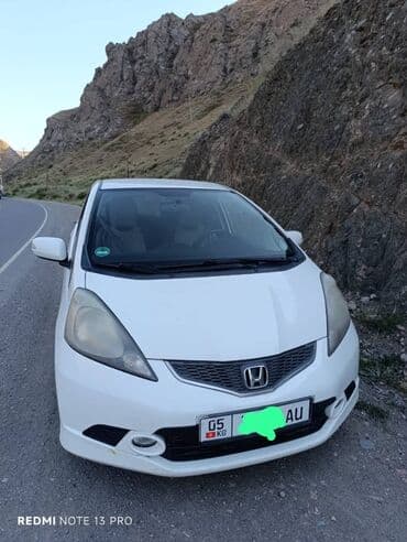 обмен дом на авто: Белый пятидверный хэтчбек Honda Jazz, идеально подходящий для — 2