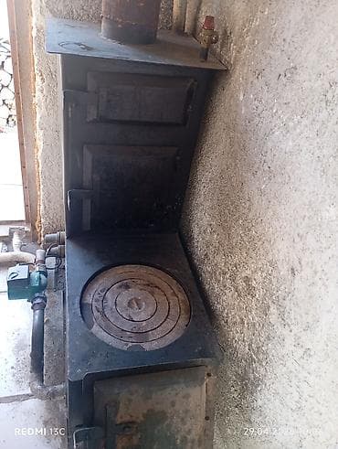 Твердотопливная печь-камин с варочной поверхностью и подключением к at lalafo.kg Твердотопливная печь-камин с варочной поверхностью и подключением к