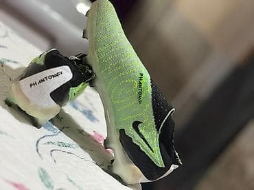 Бутсы: Футбольные бутсы Nike Phantom GX (бесшнурковые) шипованные - Тип — 4