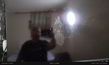 a 23: LED-телевизор V-SIN (диагональ ориентировочно 32–40") Описание: - — 3