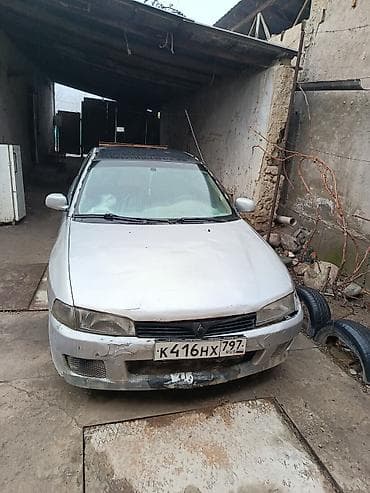 matiz diska: Mitsubishi Carisma: 1994 г., 0.1 л, Механика, Бензин, Седан — 1