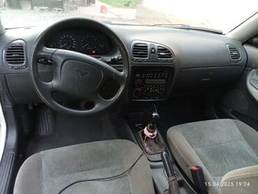 Daewoo Nubira: 1997 г., 1.5 л, Механика, Бензиновая, Седан