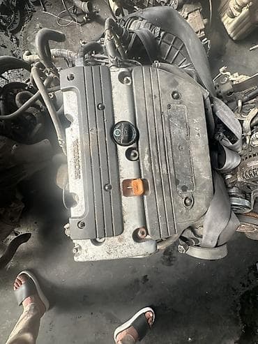 пл: Двигатель Honda K 20 рядный 4‑цилиндровый бензиновый SOHC. Крышка ГБЦ — 1