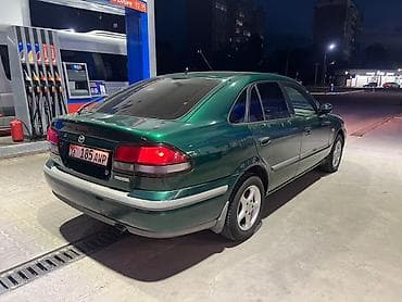 34 bwm: Mazda 626: 1998 г., 1.8 л, Механика, Бензин, Седан — 6