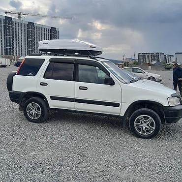 Продажа авто: Автомобиль: компактный кроссовер 5‑дверный, белый с чёрным обвесом — 1