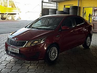 Продажа авто: Kia Rio: 2012 г., 1.6 л, Механика, Бензин, Седан — 3