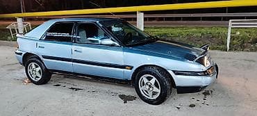 степ 1996: Mazda 323: 1994 г., 1.6 л, Механика, Бензин, Хэтчбэк — 3