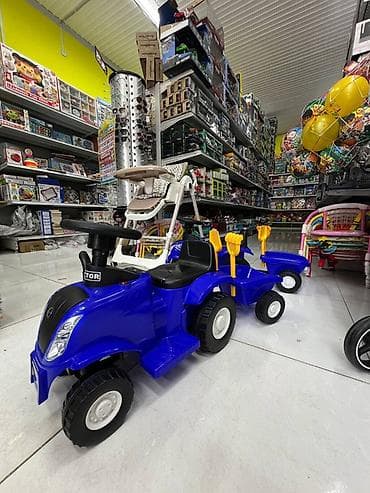 вещи каракол: Детский трактор-каталка электрический с прицепом, с музыкой синего — 3