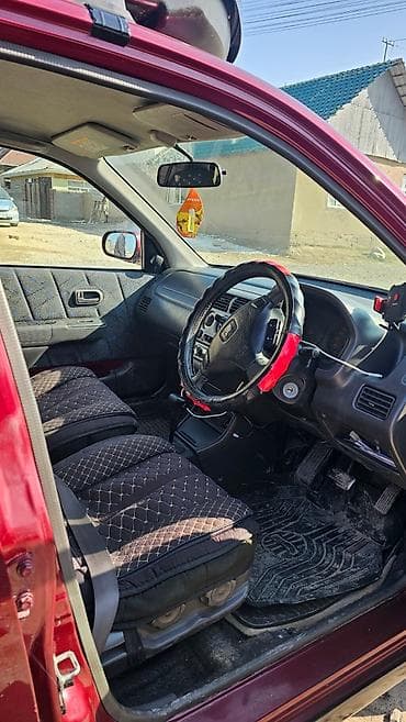 Honda: Honda Logo: 2000 г., 1.3 л, Вариатор, Бензин, Хэтчбэк — 6