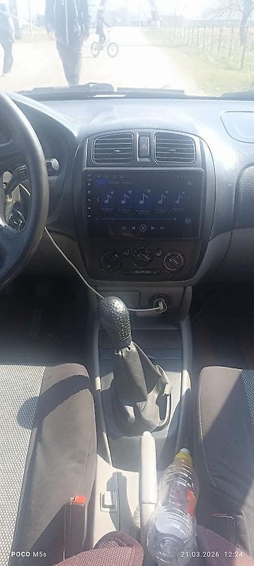 chery tiggo: Mazda 323: 2003 г., 1.6 л, Ручные, Бензин, Хэтчбэк — 4