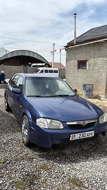 Mazda 323: 2000 г., 1.6 л, Механика, Бензин, Универсал
