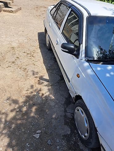 Унаа: Daewoo Nexia: 2005 г., 1.5 л, Кол менен иштөөчү, Бензин, Седан — 4