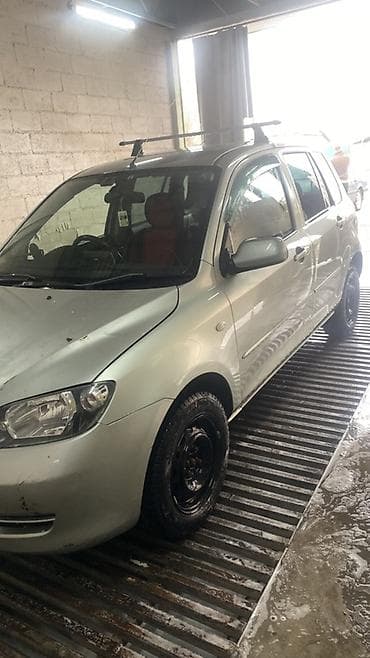 замки на авто: Mazda Demio: 2003 г., 1.5 л, Автомат, Бензин, Хэтчбэк — 2