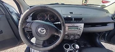 mazda 2: Mazda 2: 2007 г., Бензин, Хэтчбэк — 7