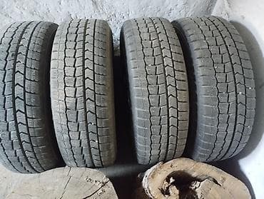 падиомник авто: Комплект зимних колёс на штампованных дисках. - Шины: Dunlop — 7