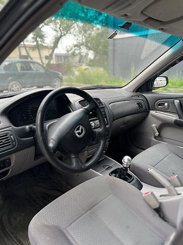 продам мазда 323: Mazda 323: 2002 г., 1.3 л, Механика, Бензин, Хэтчбэк — 9