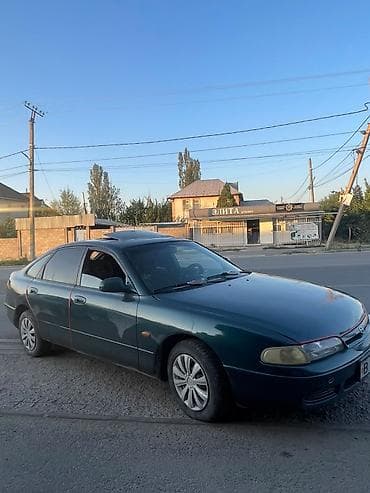 машина салон: Mazda 626: 1999 г., Механика, Седан — 4