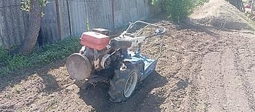 мото ролик: Мотоблок с навесным оборудованием Описание: - Бензиновый мотоблок — 7