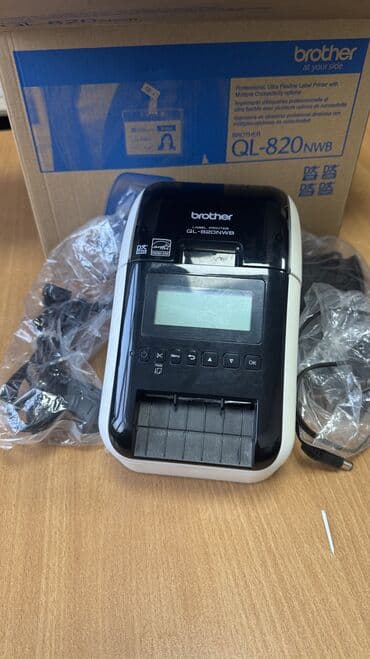 оборудование для ip телефонии беспроводная настольные: Принтер этикеток Brother QL‑820NWB - Профессиональный термопринтер — 1