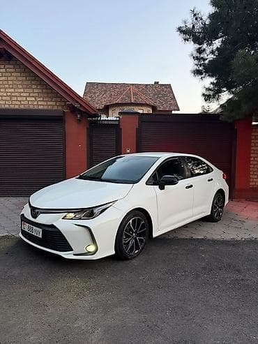 Toyota Corolla: 2019 г., 1.8 л, Автомат, Гибрид, Седан