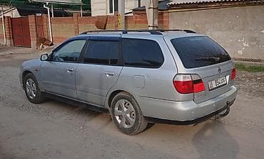 p11: Nissan Primera: 2000 г., 1.8 л, Механика, Бензин, Универсал — 6