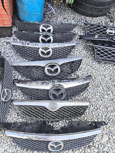 Решетка радиатора Mazda 2001 г., Б/у, Оригинал