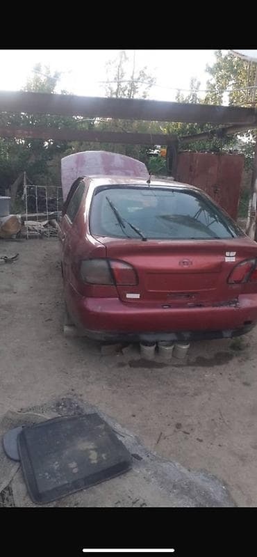aion v plus: Nissan Almera (седан), красный цвет, кузов P11. Описание: - — 7