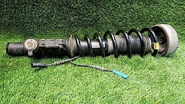 е70 e70: Передний амортизатор BMW 2009 г., Б/у, Оригинал — 3