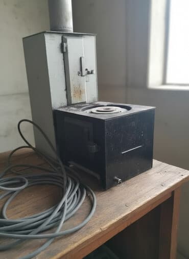 Металлическая печь с варочной поверхностью и дымоходом - Тип