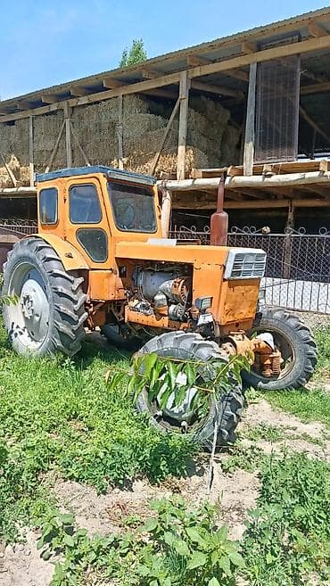 Трактор колесный универсально-пропашной Описание: - Колесная
