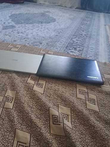 видеокарта 5060: Два ноутбука: Lenovo (черный корпус) и Acer (светлый корпус). - — 1