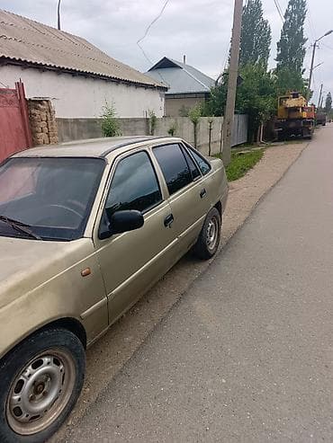 электро тулпар: Daewoo Nexia: 2010 г., 1.5 л, Кол менен иштөөчү, Бензин, Седан — 5