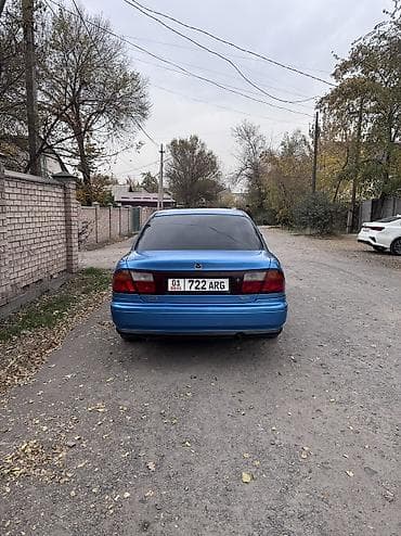 кузов маз: Mazda 323: 1999 г., 1.5 л, Ручные, Бензин, Седан — 2