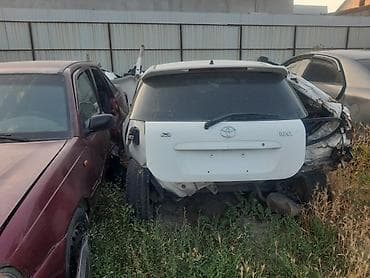 япония машина: Toyota Corolla: 2003 г. — 5