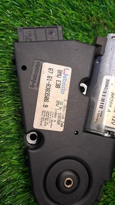 е38: Блок привода сдв.крышки люка с модулем е46, е38 Номер 67.61—.9 — 5