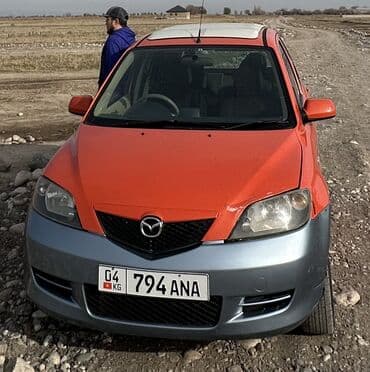 срочно в связи с переездом: Mazda Demio: 2004 г., 1.5 л, Автомат, Хэтчбэк — 1