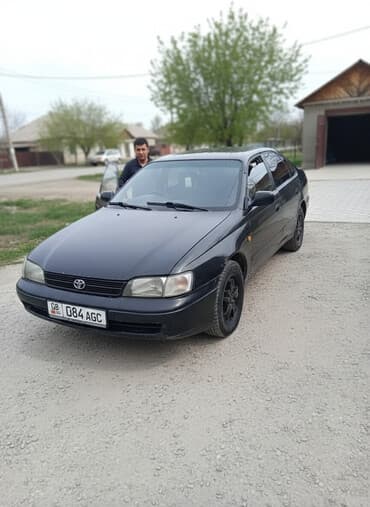 тайота ландкрузер 80: Toyota Carina: 1995 г., 2 л — 2