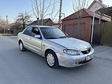 launch 431: Mazda 323: 2003 г., 1.6 л, Механика, Бензин, Седан — 4