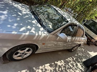 Kia Magentis: 2002 г., 2 л, Кол менен иштөөчү, Бензин, Седан — 7
