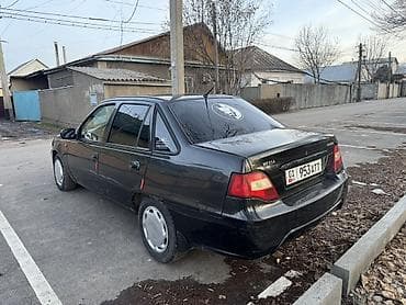 2011: Daewoo Nexia: 2011 г., Механика, Седан — 2
