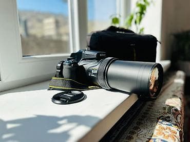 mini dv: Nikon Coolpix P1000 — ультразум‑камера с гигантским диапазоном зума и — 1